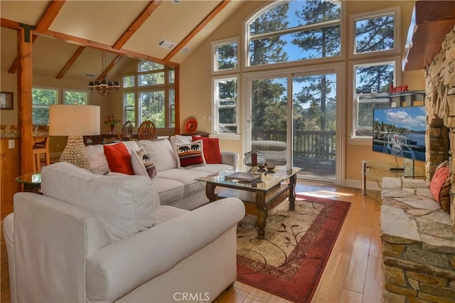 173 Grizzly Rd, Lake Arrowhead, CA 92352 - living room featuring light wood finished floors, high vaulted ceiling, beam ceiling, and a chandelier