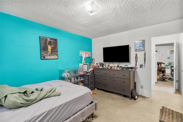 carpeted bedroom with a textured ceiling