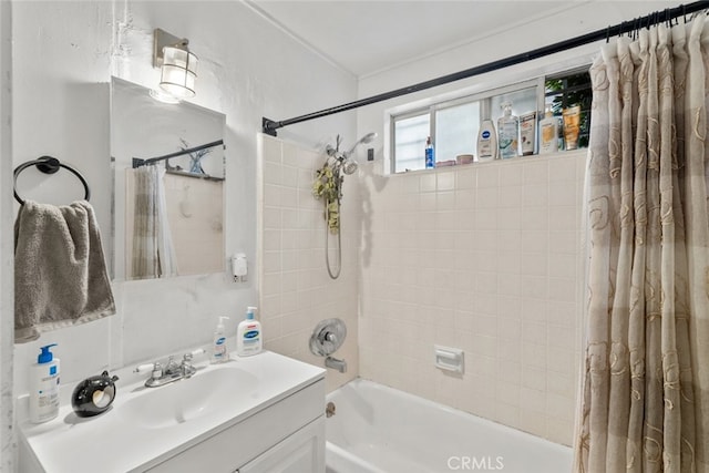 bathroom with shower / bathtub combination with curtain and vanity