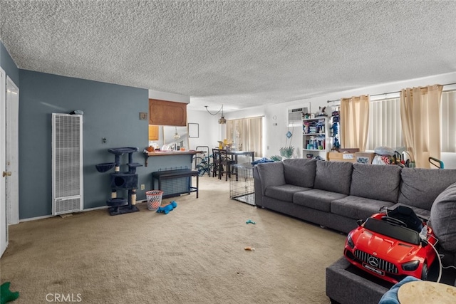 carpeted living room with a textured ceiling