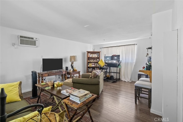 living room featuring a wall mounted AC and dark hardwood / wood-style floors