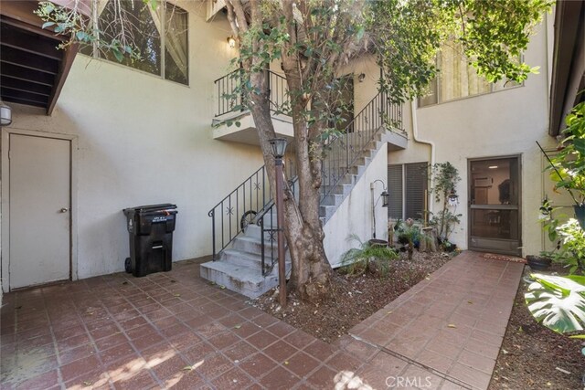 property entrance with a patio area