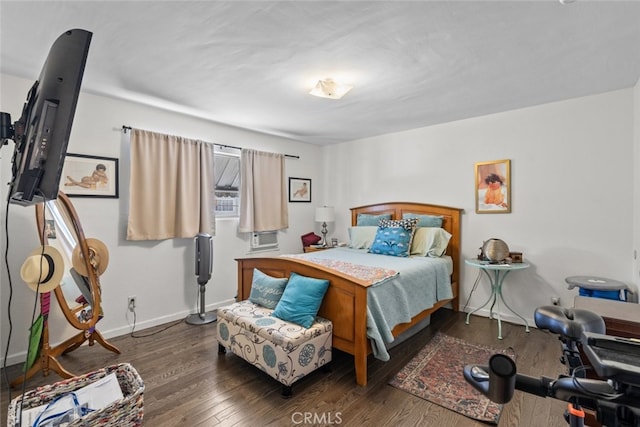 bedroom featuring dark hardwood / wood-style floors