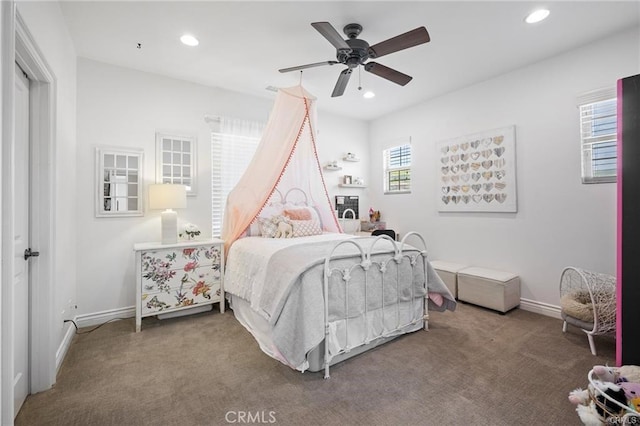 carpeted bedroom with ceiling fan