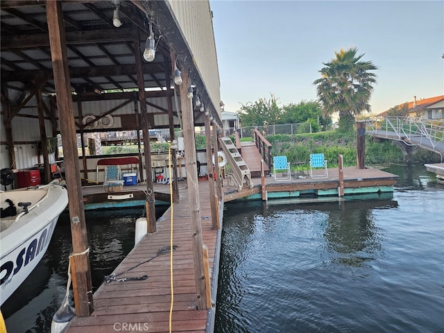 dock area with a water view