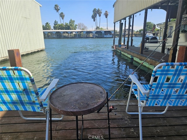 view of dock with a water view