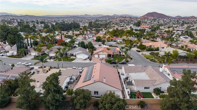 bird's eye view featuring a residential view and a mountain view