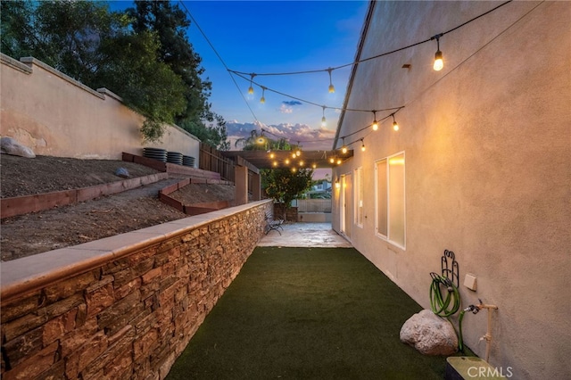 view of yard featuring a fenced backyard and a patio