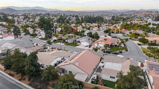 bird's eye view featuring a residential view and a mountain view