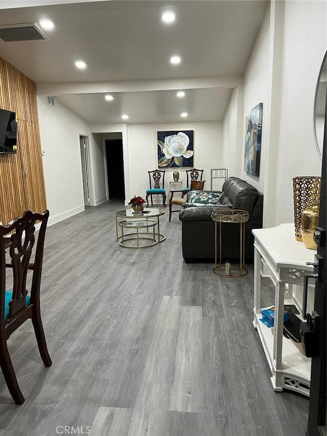 living room with dark hardwood / wood-style floors