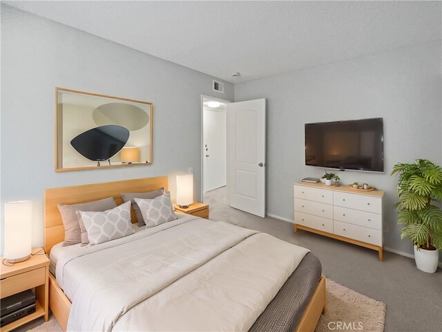 bedroom featuring carpet flooring