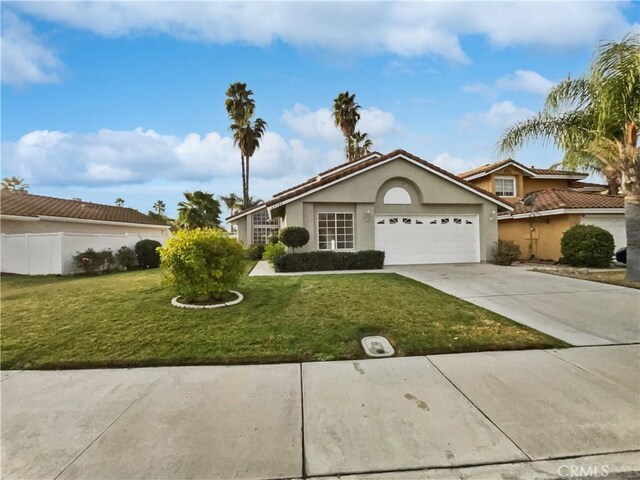 ranch-style house with a front lawn and a garage