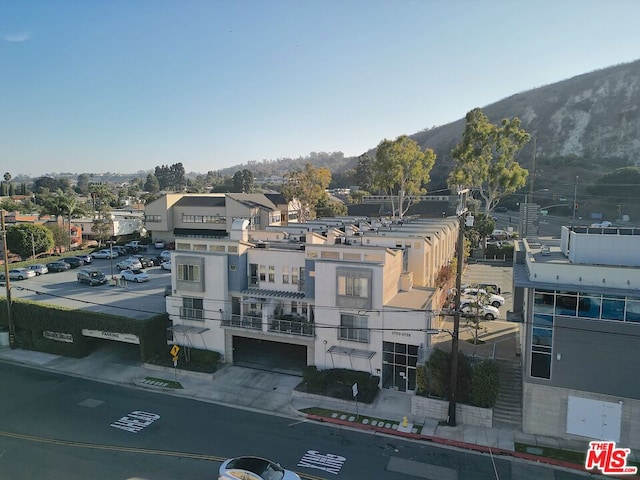 drone / aerial view featuring a mountain view