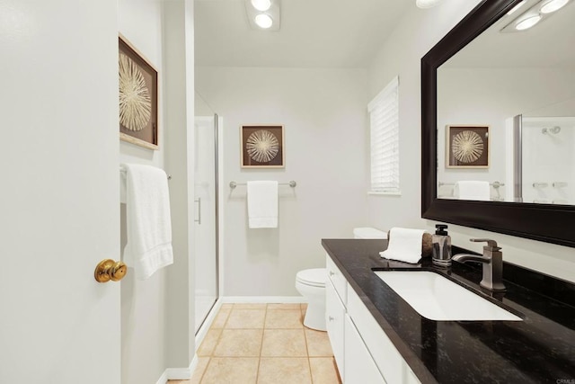 bathroom featuring tile patterned floors, toilet, an enclosed shower, and vanity