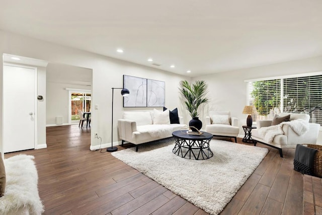 living room featuring dark hardwood / wood-style floors