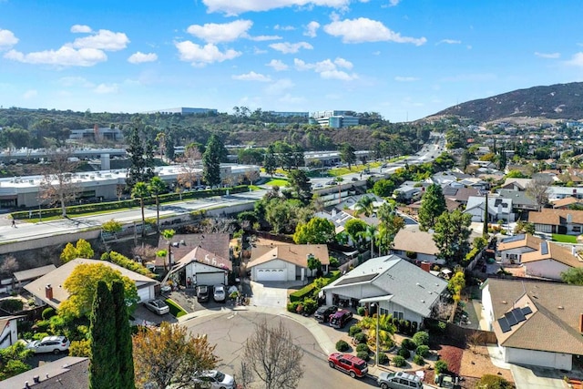 birds eye view of property featuring a mountain view