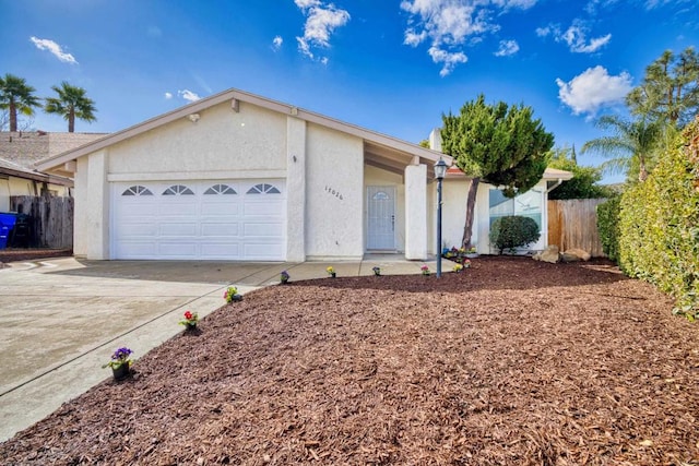 ranch-style home with a garage