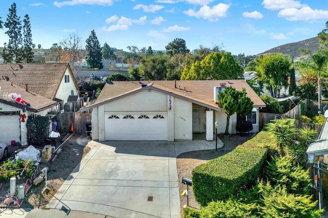 single story home with a garage