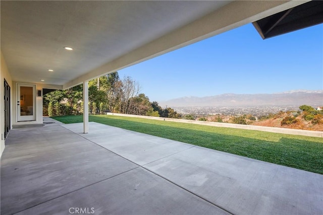 view of patio with a mountain view