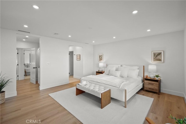 bedroom with light hardwood / wood-style flooring