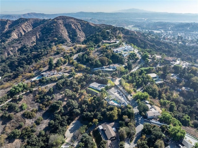 birds eye view of property featuring a mountain view