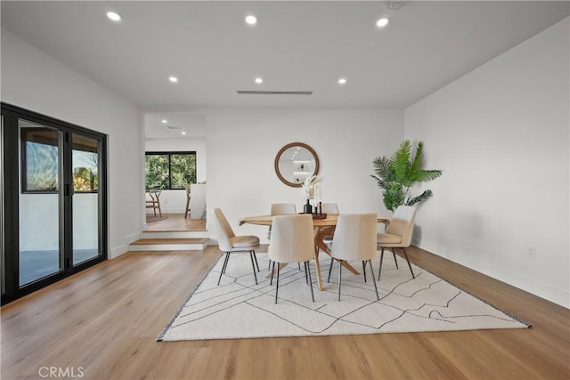 dining room featuring light hardwood / wood-style floors