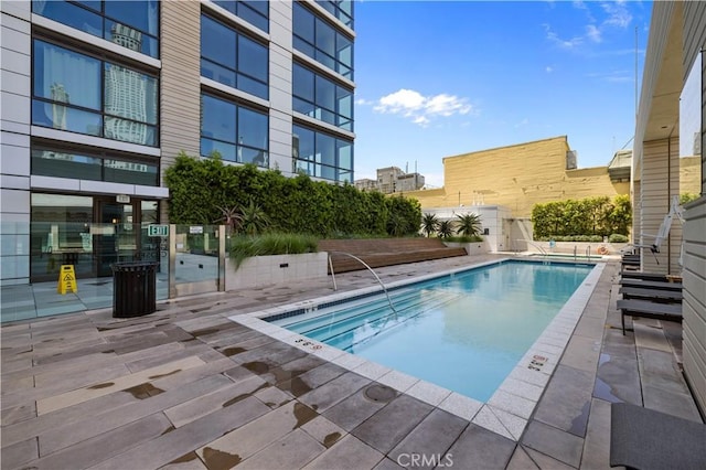 view of pool with a patio