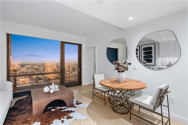 dining area with light hardwood / wood-style flooring