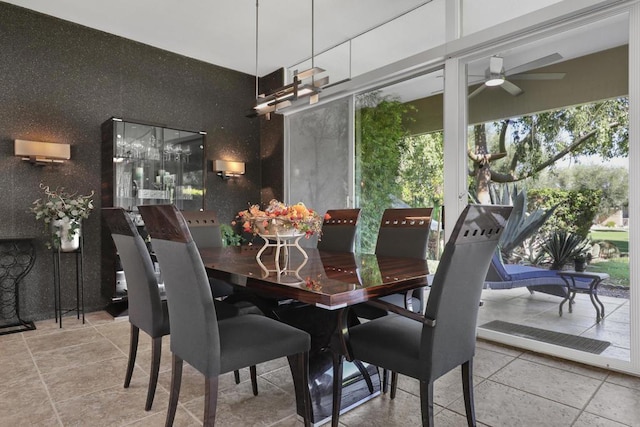 dining area with ceiling fan