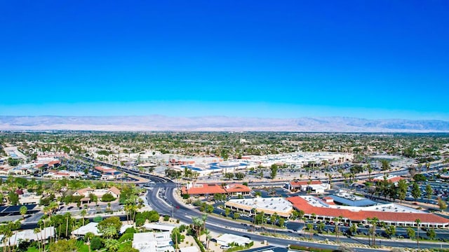 drone / aerial view featuring a mountain view