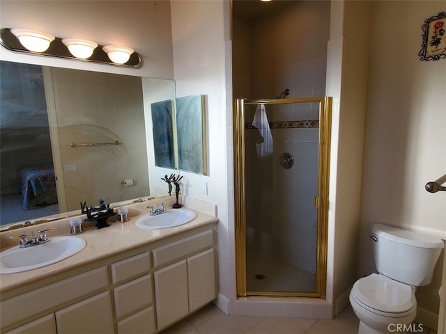 bathroom with toilet, tile patterned floors, walk in shower, and vanity