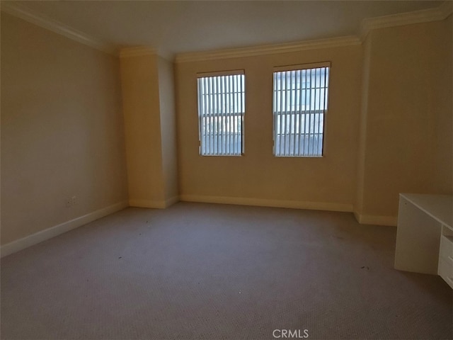 unfurnished room with light carpet and crown molding