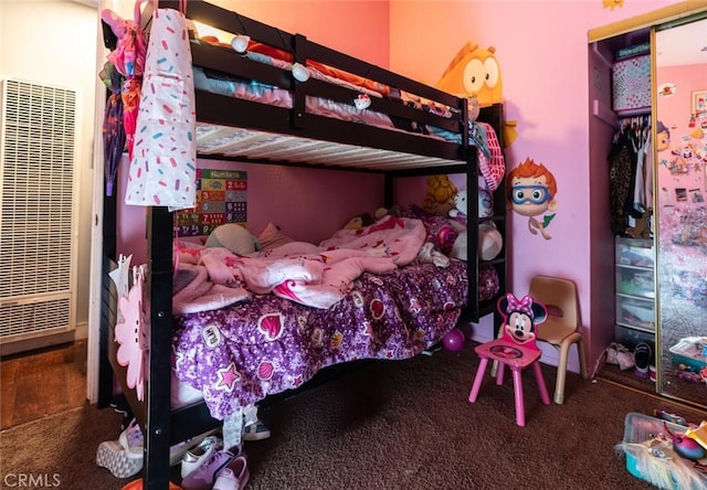 bedroom featuring carpet