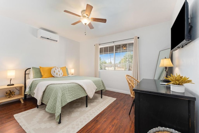 bedroom with ceiling fan, dark hardwood / wood-style flooring, and a wall mounted air conditioner