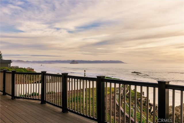 deck at dusk with a water view