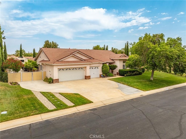 ranch-style house featuring a front yard and a garage