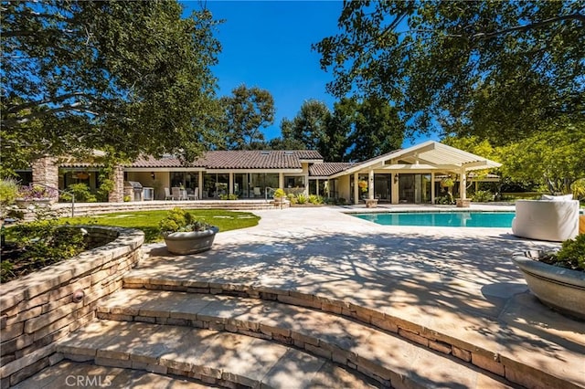 view of pool with a patio