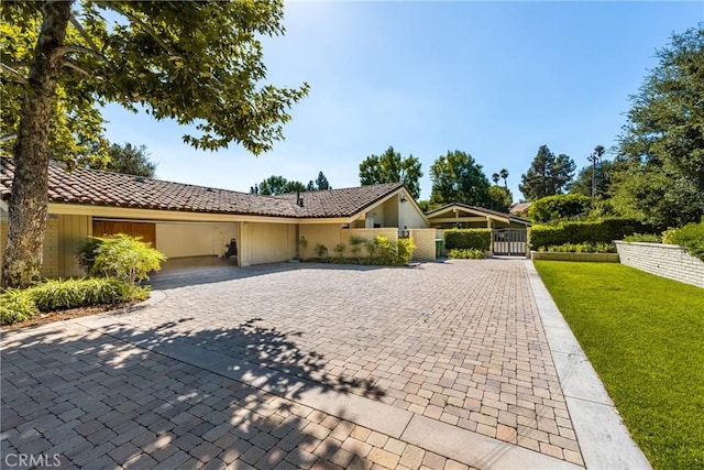 ranch-style house with a front yard