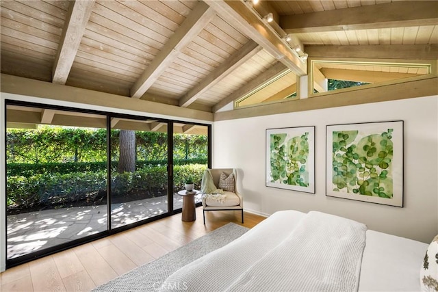 bedroom featuring wood ceiling, lofted ceiling with beams, track lighting, access to exterior, and hardwood / wood-style floors