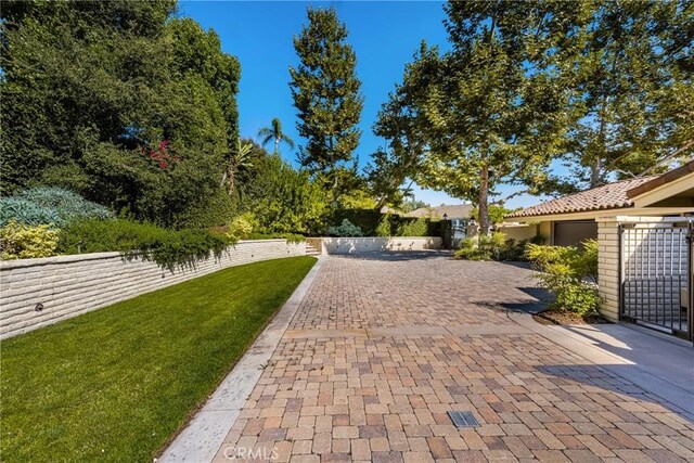 surrounding community featuring a patio