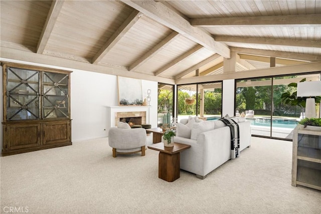 carpeted living room featuring beamed ceiling and high vaulted ceiling