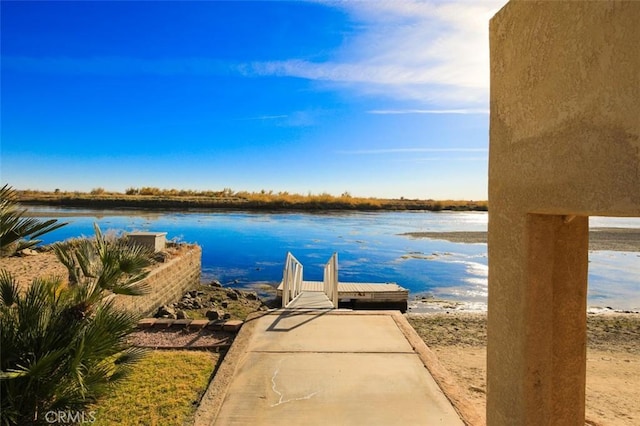 dock area featuring a water view