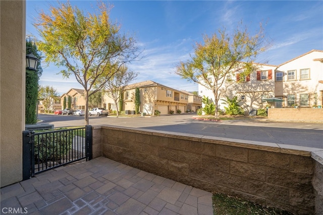 view of patio / terrace featuring a garage