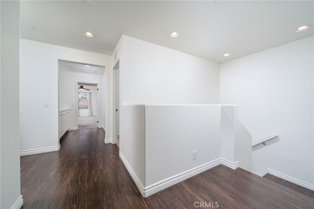 hallway featuring dark hardwood / wood-style floors