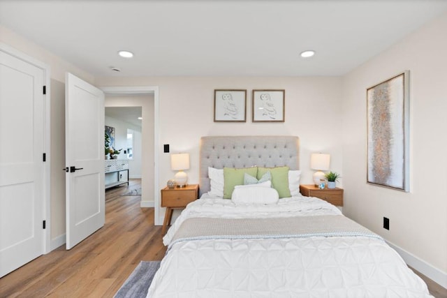 bedroom featuring light hardwood / wood-style floors