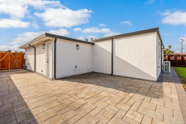 rear view of house featuring a patio