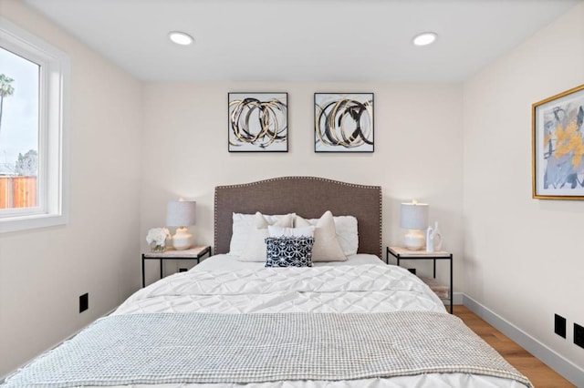 bedroom with light wood-type flooring