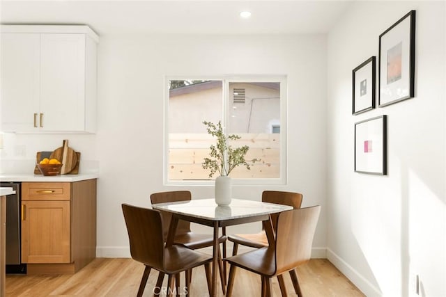 dining room featuring light hardwood / wood-style flooring