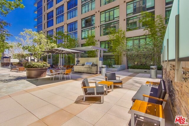 view of home's community featuring a patio area