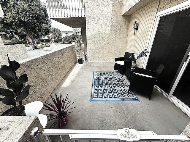 view of patio / terrace featuring a balcony